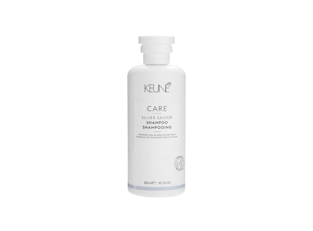 Keune-Care-Silver-Savior-Shampoo - GoHair.gr Keune Care Silver Savior Shampoo 300ml Μωβ σαμπουάν για ψυχρά ξανθά μαλλιά - διατηρεί τις ξανθές, ασημί, λευκές ή λιλά αποχρώσεις φρέσκες και φωτεινές - εξουδετερώνει τις χάλκινες και κίτρινες ζεστές.