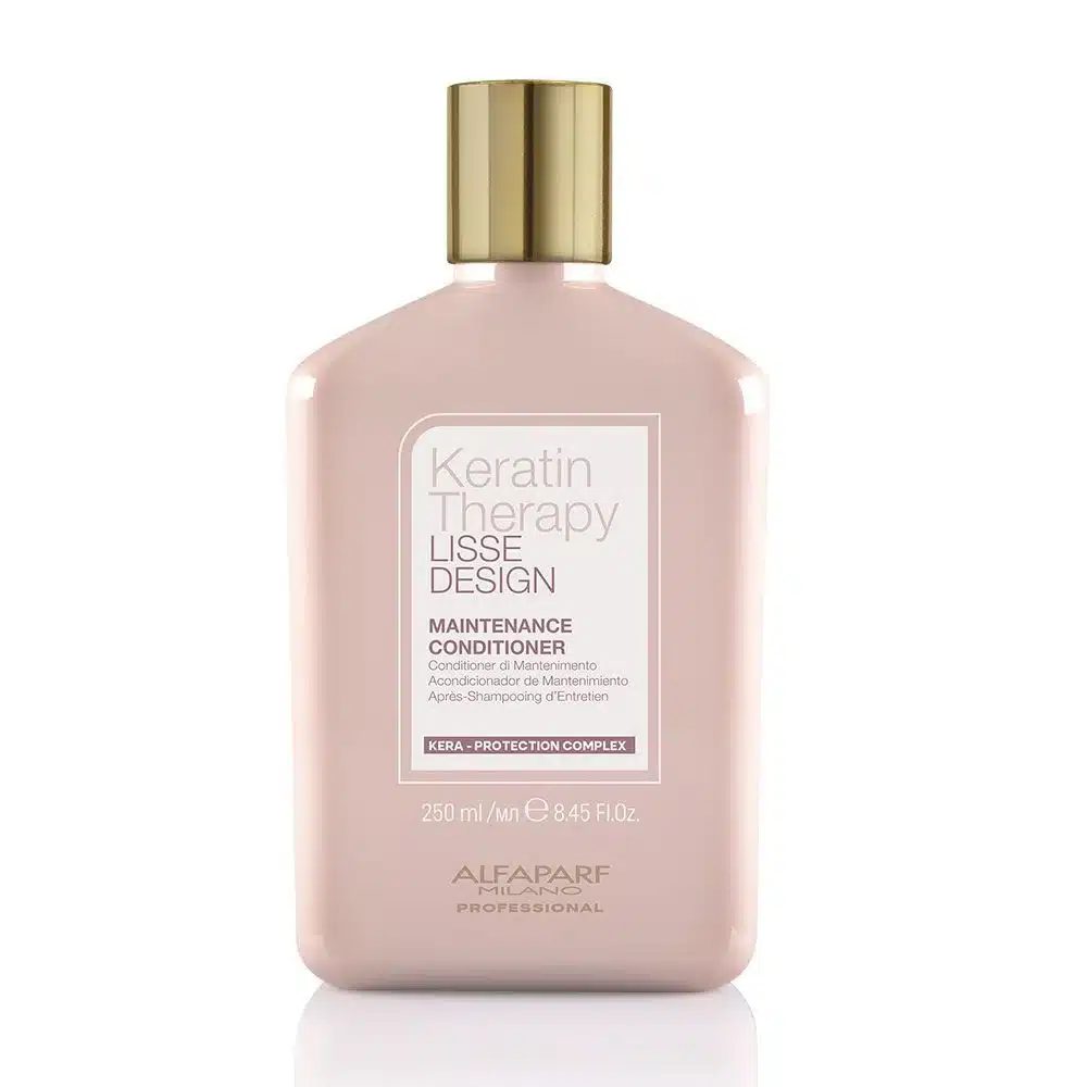 alfaparf-lisse-design-keratin-therapy-maintenance-conditioner-250ml-8022297141435_1 - GoHair.gr Maintenance conditioner bottle labeled Keratin Therapy Lisse Design by Alfaparf Milano, 250 ml (8.45 fl oz) pink bottle with gold cap.