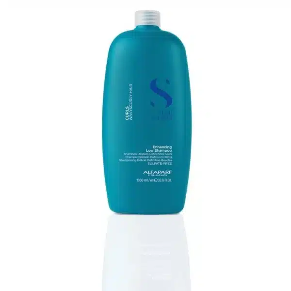 Teal blue bottle of Alfaparf Milano Enhancing Low Shampoo with a white cap, sulfate-free, 1000 ml.