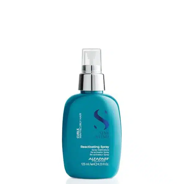 Blue spray bottle with a silver spray nozzle, labeled 'Reactivating Spray' for hair care, on a white background.