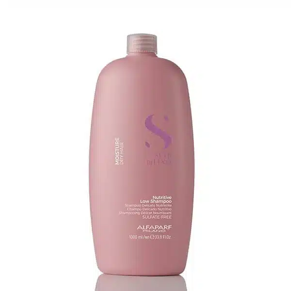 Pink bottle of moisturizing shampoo with a lilac logo, standing upright against a white background (1000 ml).