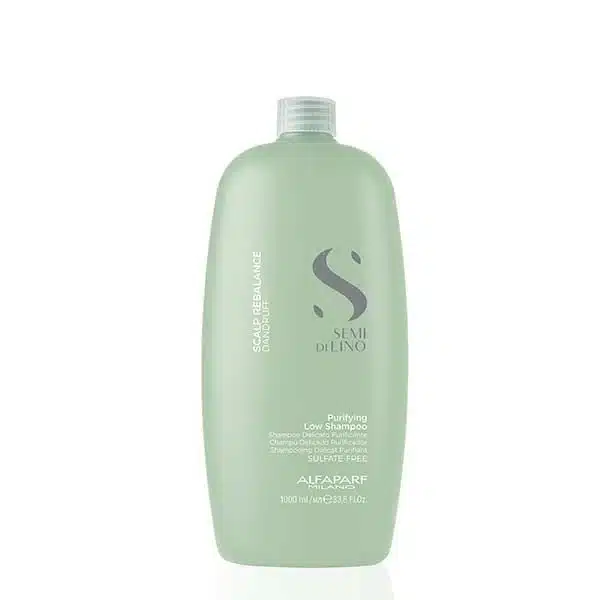 Light green shampoo bottle with a silver cap and an abstract S logo on the front, standing upright on a white background.
