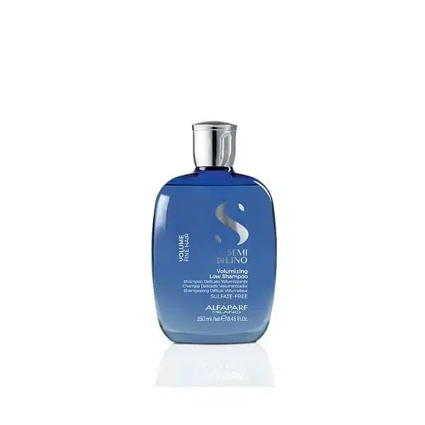 Blue Alfaparf Semi di Luno Volume Shampoo bottle with a silver cap on a white background.