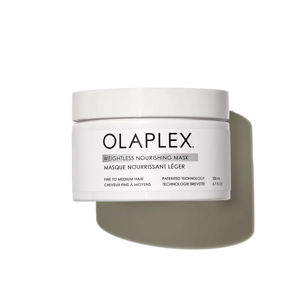 olaplex_weightless_nourishing_mask_200ml_2__1757503226 - GoHair.gr Olaplex Weightless Nourishing Mask in a white jar with black text on a white background.